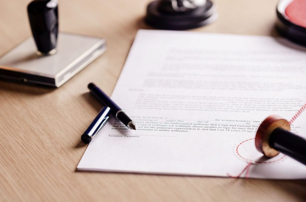 Pen on paper waiting to be notarized for a business in Flagler Beach, FL